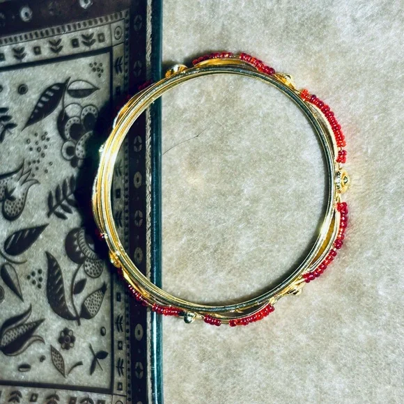 Gold-Tone Women’s Bangle Bracelet with Red Bead Accents - Picture 2 of 3